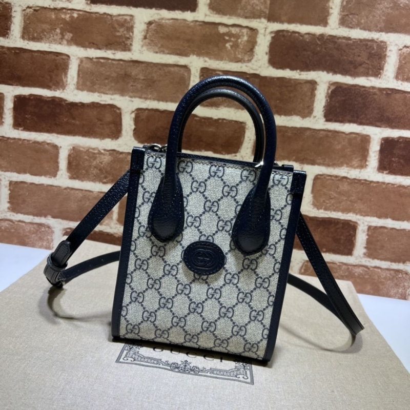 G*u*i top handle bags